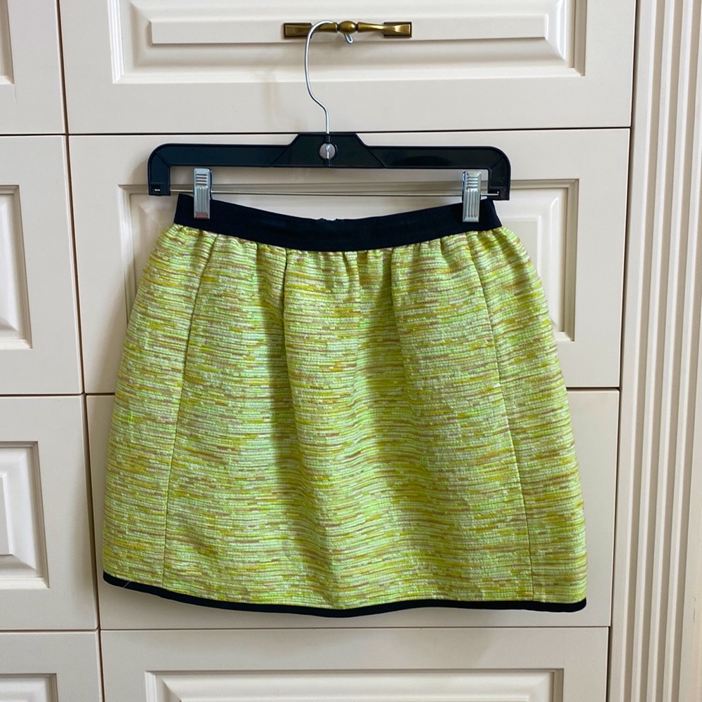 Very contemporary lime green mini by Wilfred.  Black detailing.  Size 6.